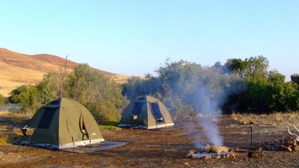 Mobiles Zeltcamp in Namibia, Ovahimba und Epupa Fälle, Namibia | Abendsonne Afrika