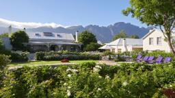 Garten des Le Quartier Français in Südafrika | Abendsonne Afrika